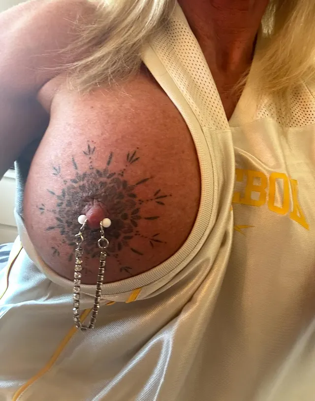 Do you like my tattooed tits and pierced nipples?